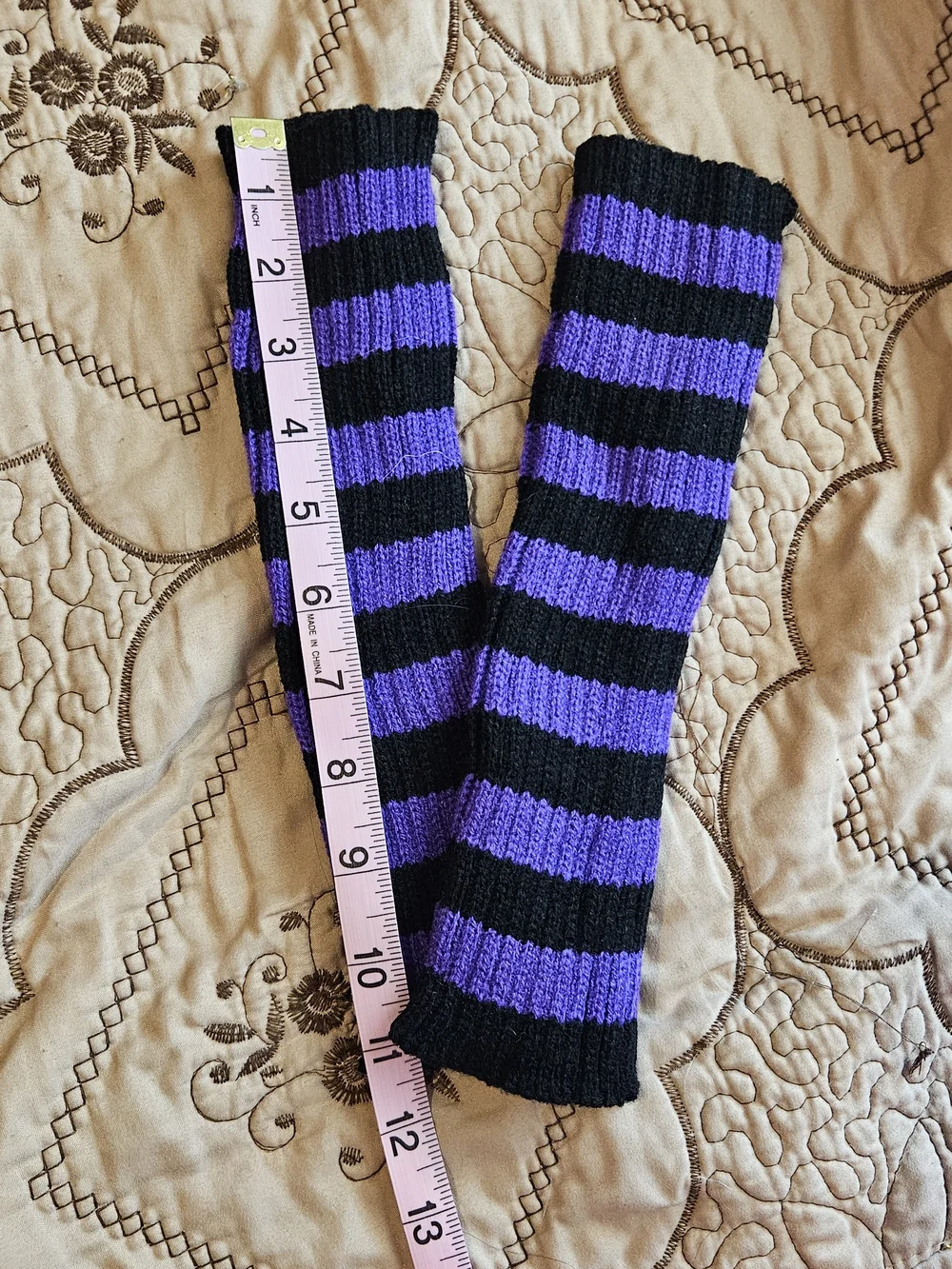 black and purple arm warmers